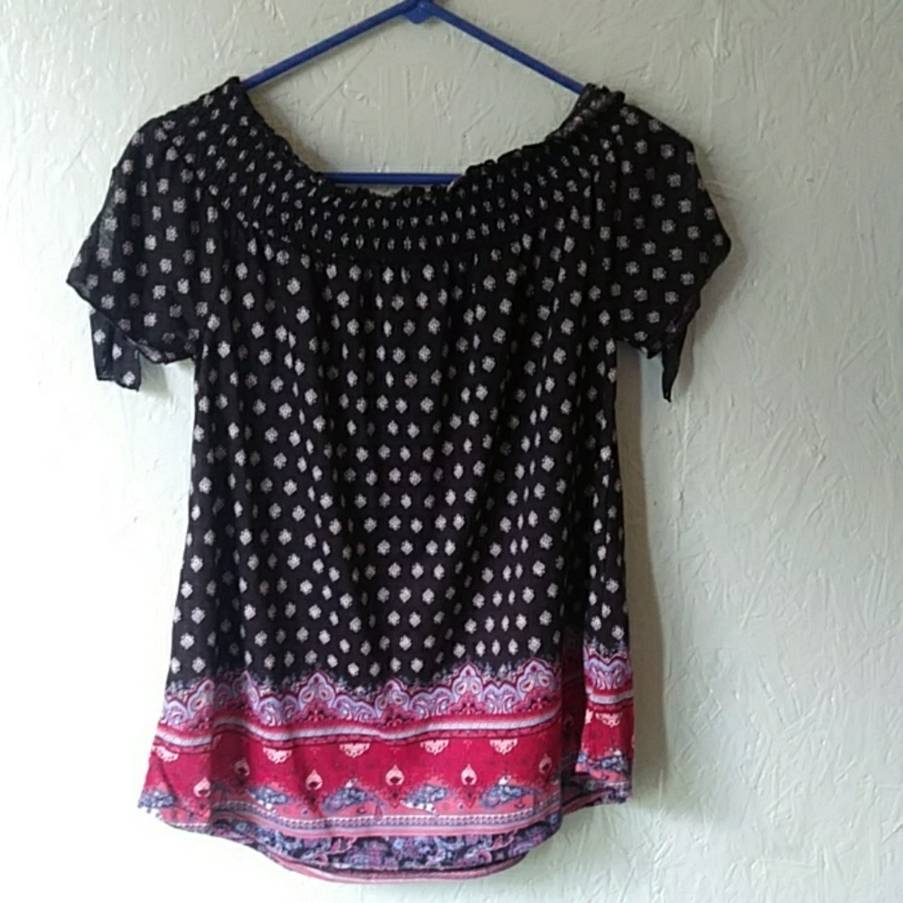 A black off the shoulder shirt